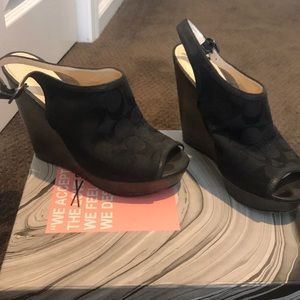 Black COACH wedges